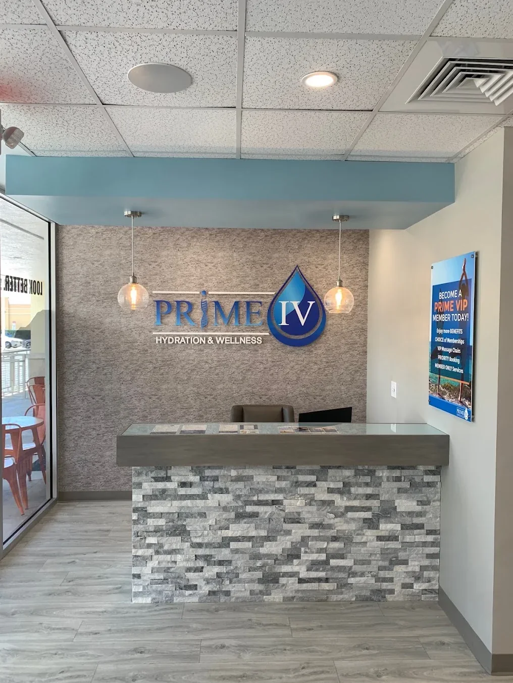 Prime IV Fort Lauderdale reception counter and pendant lights.