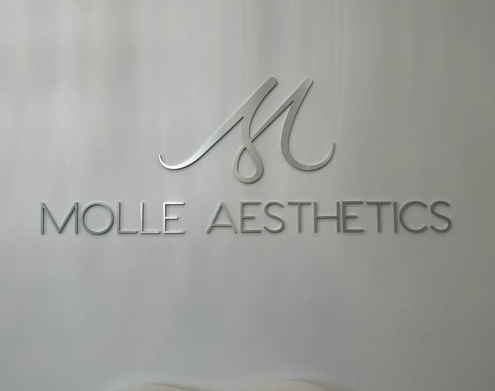 Office wall and interior at Molle Aesthetics