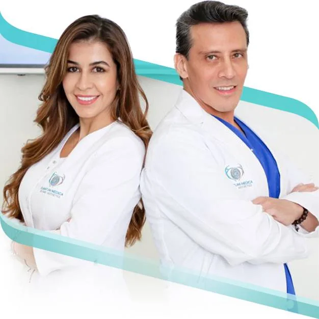 Carlos and Carolina Haro in Quantum Medica-branded coats