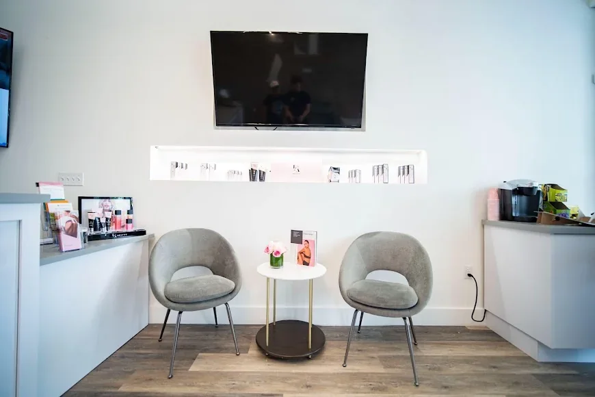 LaserAway Coral Gables waiting chairs and refreshment station.
