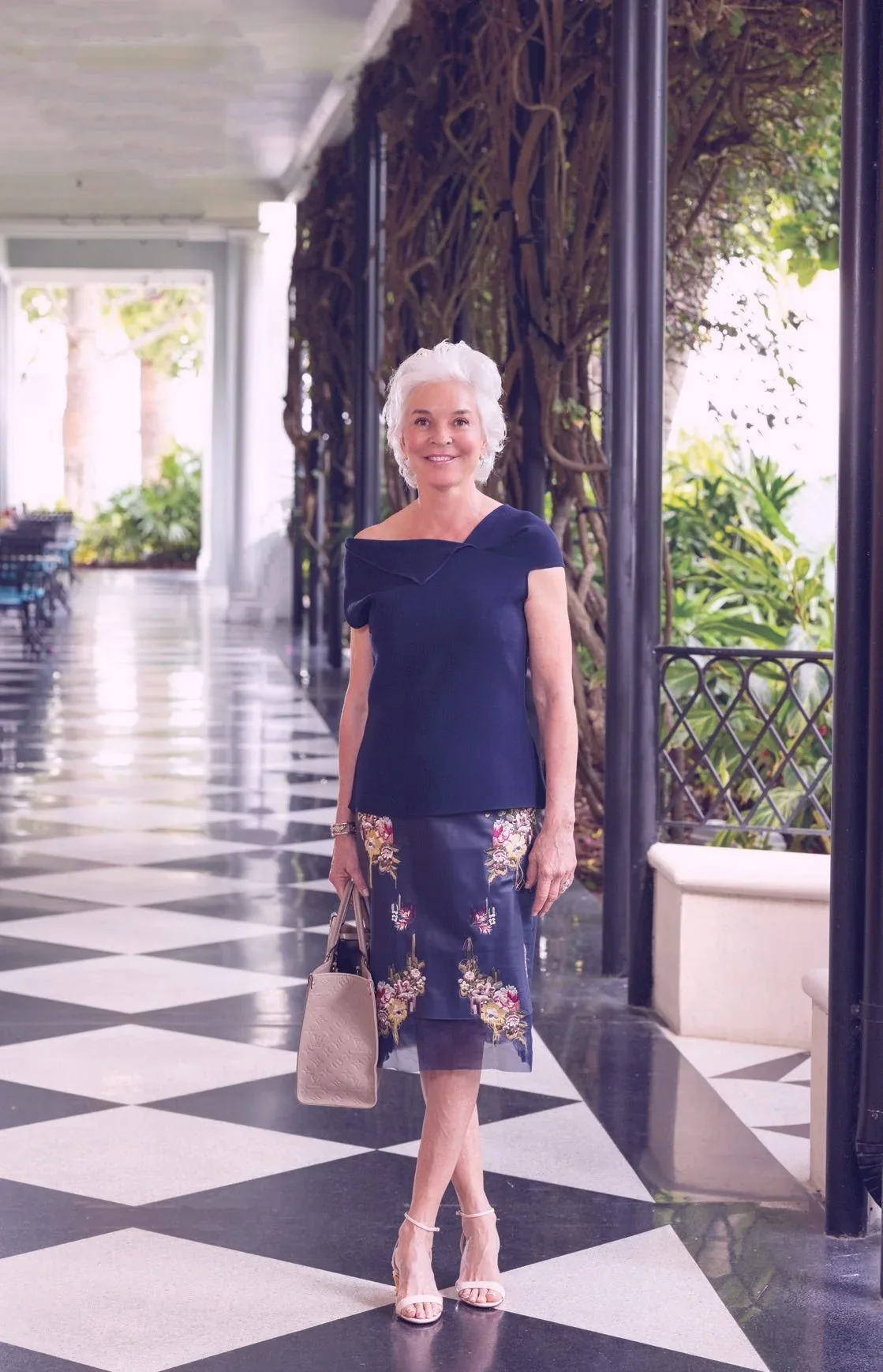 The owner featured on Tighter Lines' website in a posed full-length portrait.