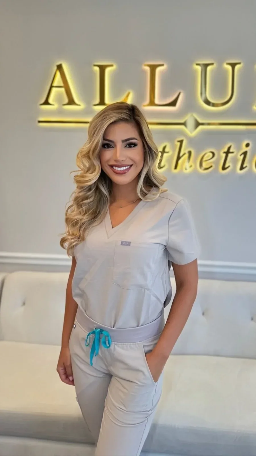 Allure Aesthetics team member in clinical attire