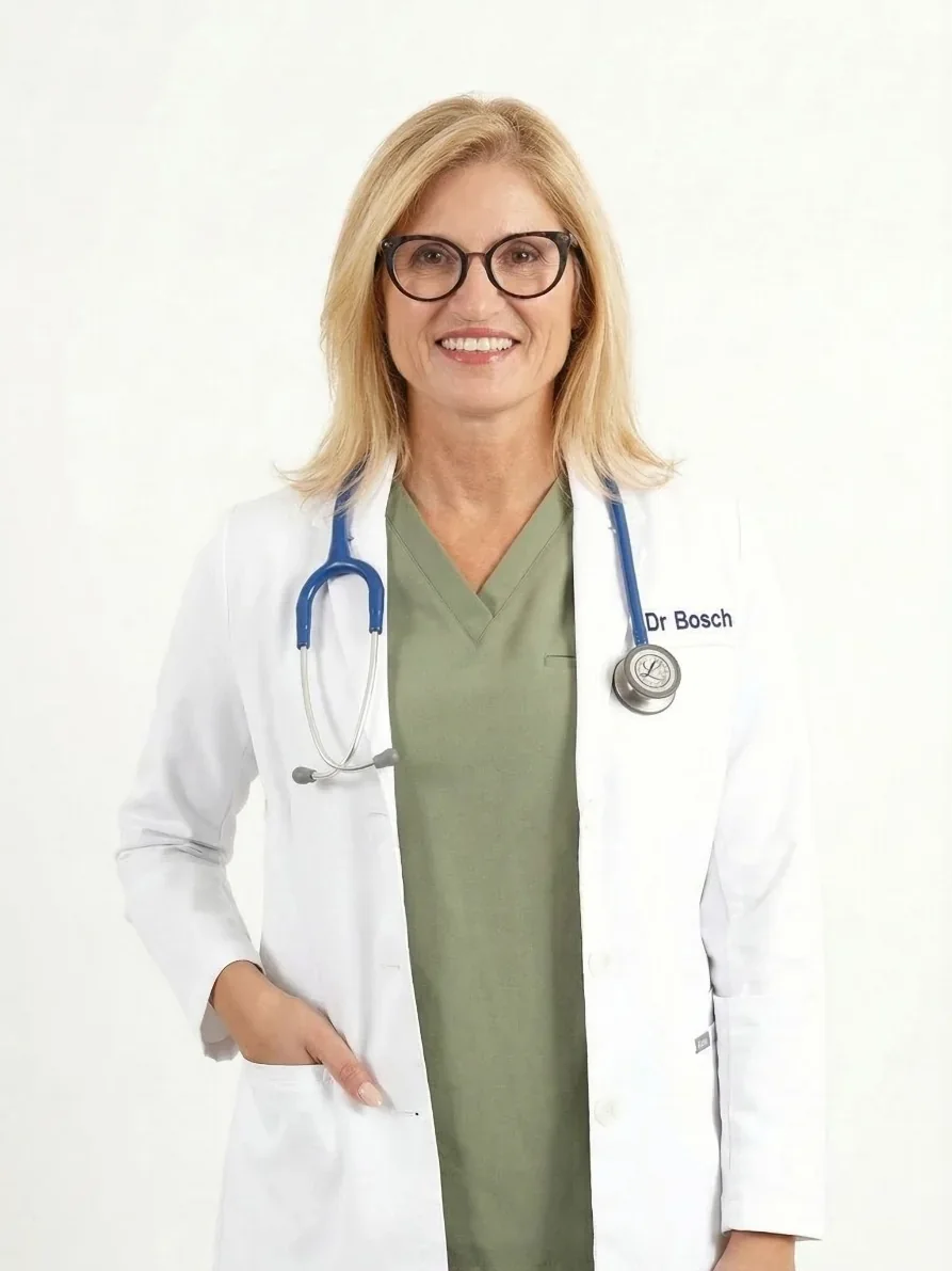 Dr. Lourdes Bosch in an embroidered white coat with a stethoscope.