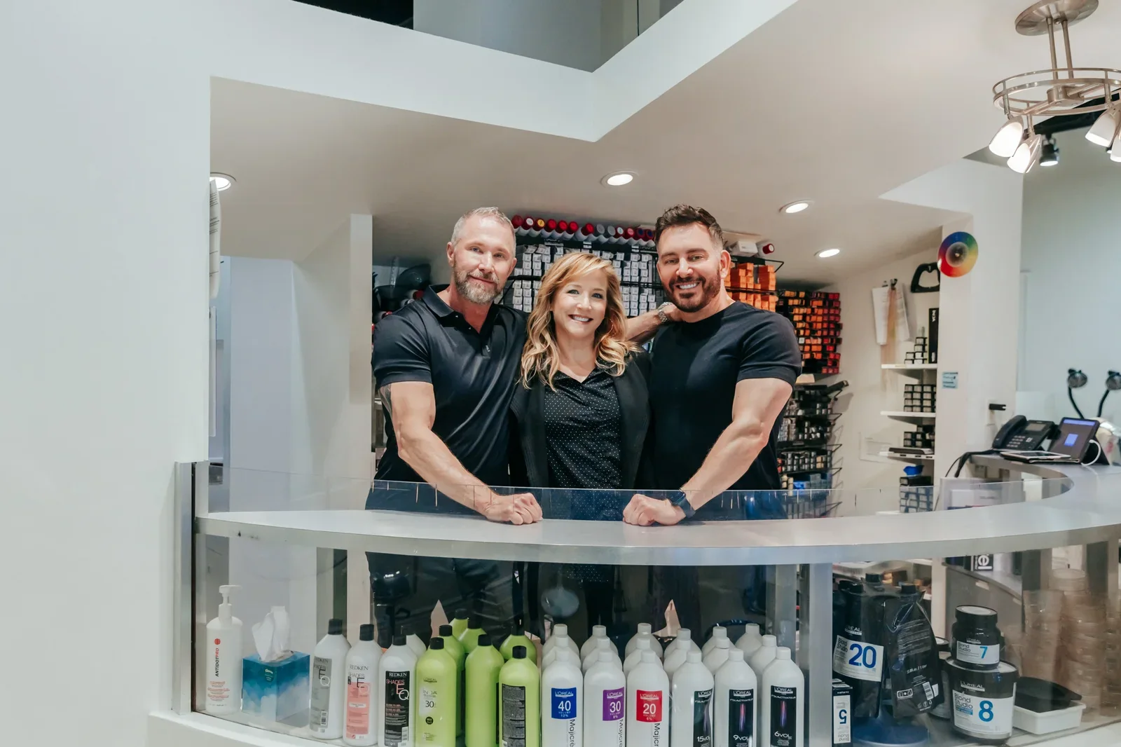 Group of Anushka Spa & Salon employees smiling inside the West Palm Beach location