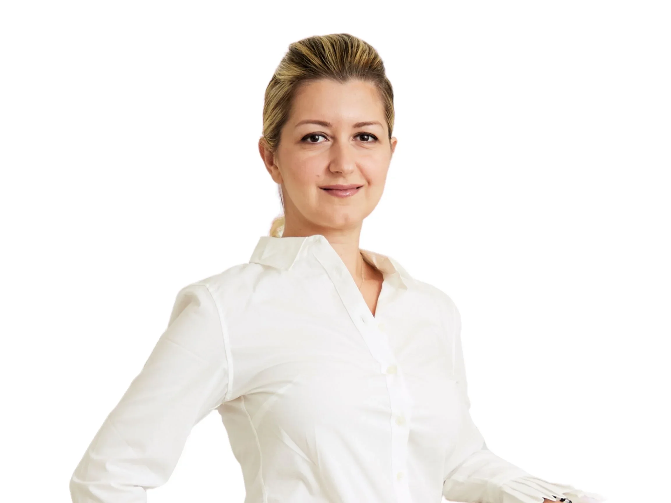Portrait of Gen Rozenblat wearing a white blouse against a white background.