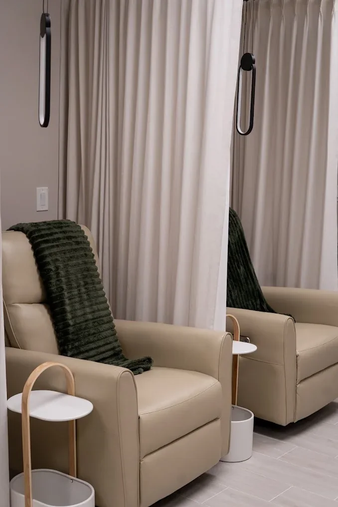 remedie’s reclining-chair lounge with privacy curtains.