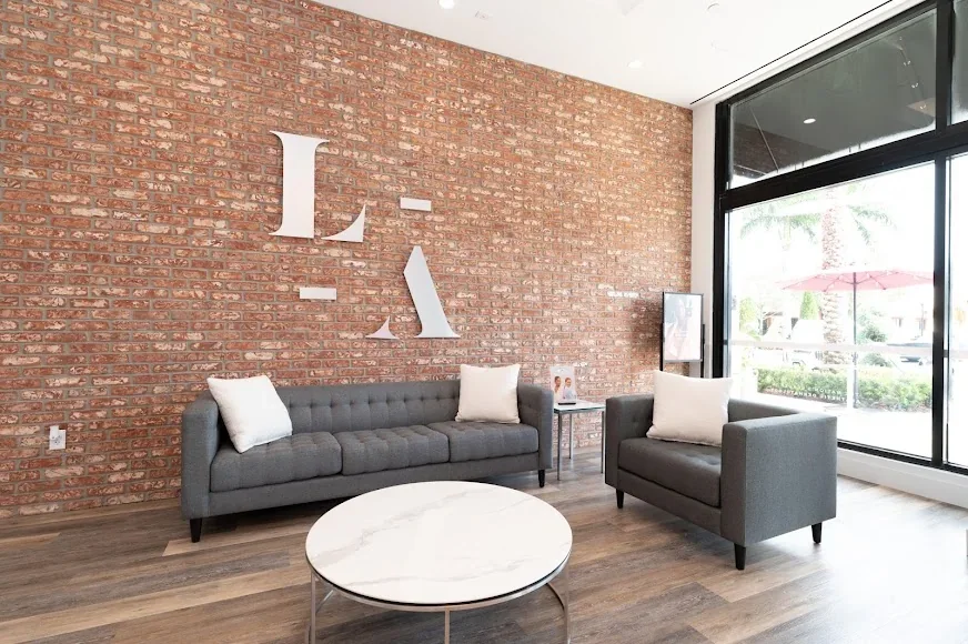 LaserAway Pembroke Pines waiting lounge by the front window.