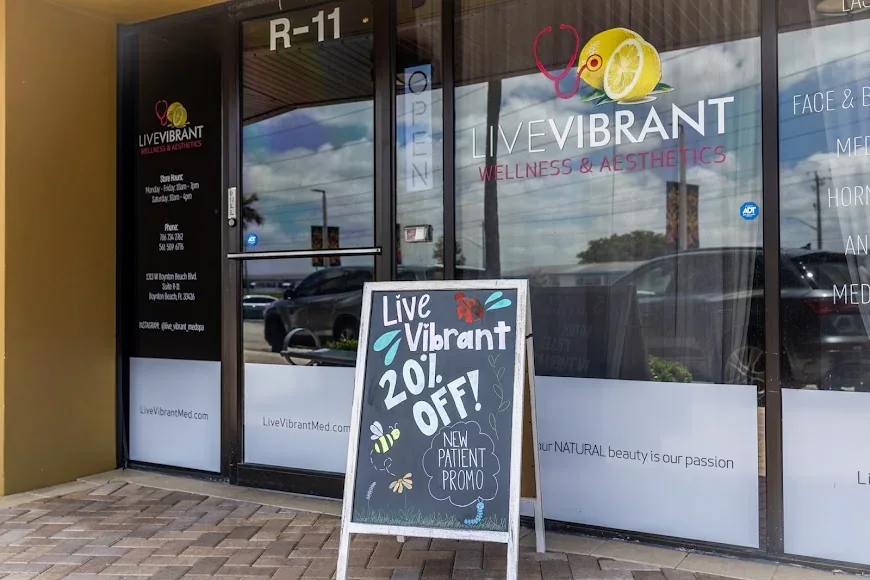 LiveVibrant signed entrance at Suite R-11.